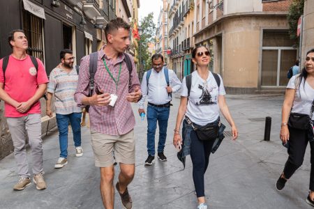 Guided tour in Madrid visiting historic landmarks, including famous plazas and cultural sites.
